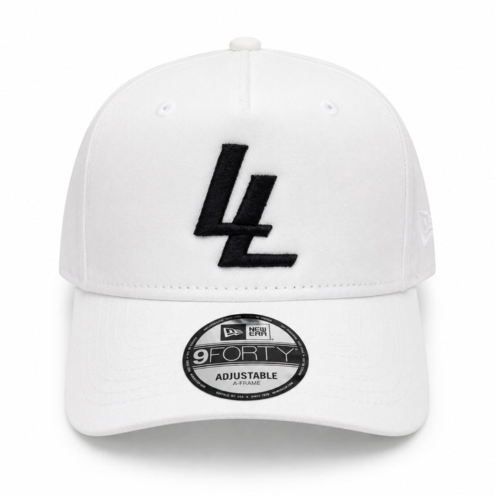 Translation missing: en.A white baseball cap with a black embroidered 'LL' logo on the front and a black circular '9FORTY ADJUSTABLE' sticker on the brim, photographed against a clean white background