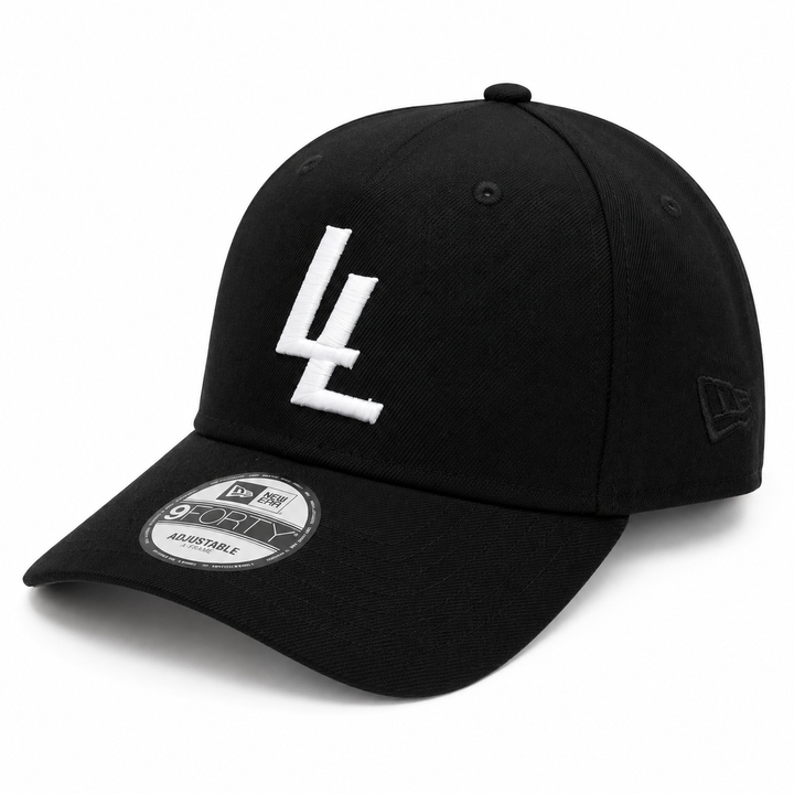 Translation missing: en.A black baseball cap with a white embroidered 'LL' logo on the front, a black New Era flag logo on the side, and a silver and black 9FIFTY sticker on the brim, set against a plain white background