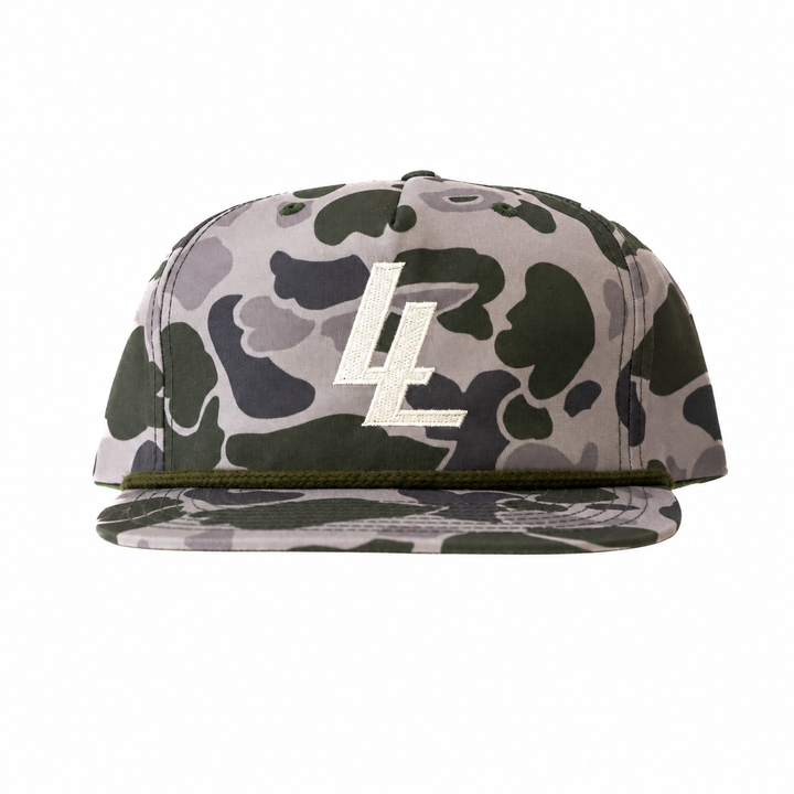 Translation missing: en.A flat-brim baseball cap featuring a green, gray, and black camouflage pattern with a large white embroidered 'LL' logo on the front, set against a plain white background