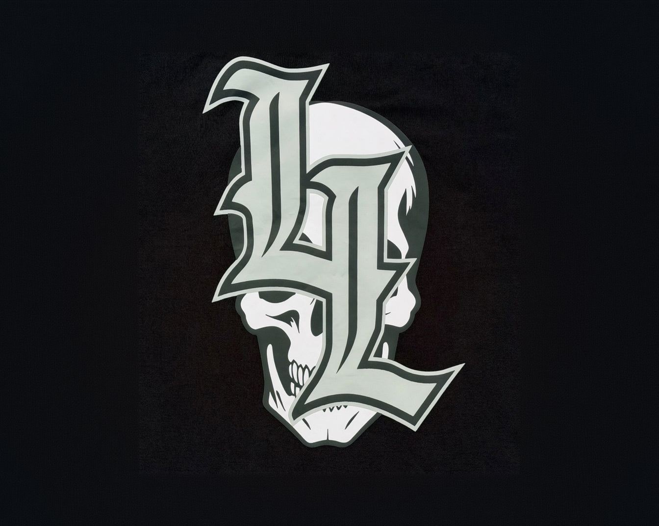 Gray 'L' with skull design on a black background
