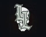 Gray 'L' with skull design on a black background