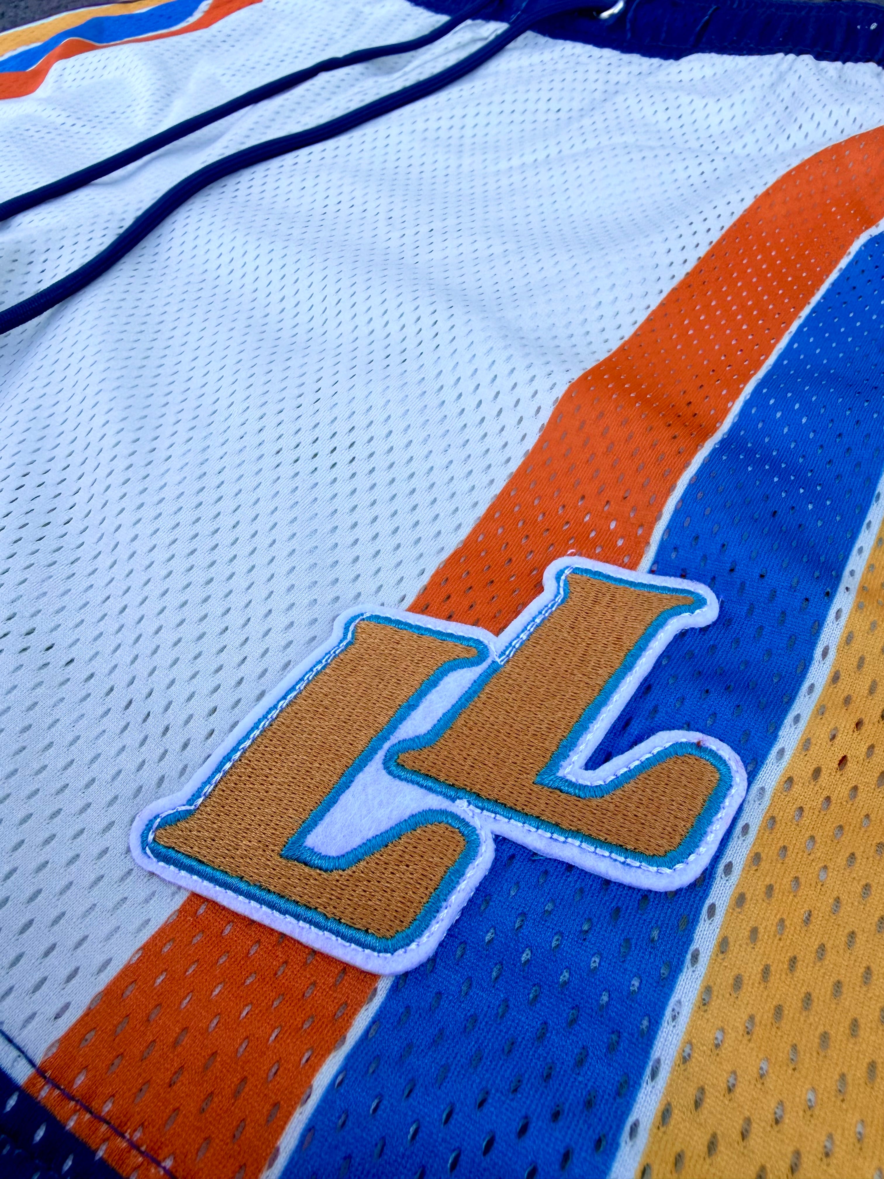 Retro Heat shorts LL logo close-up