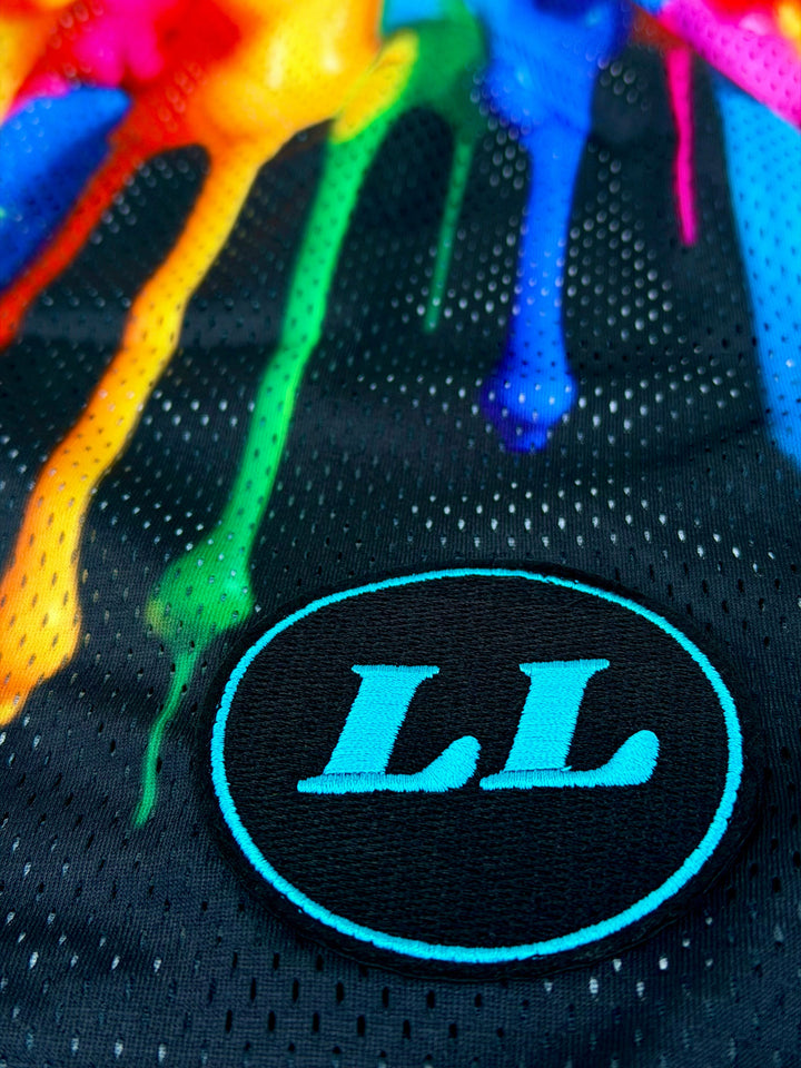 Translation missing: en.Colorful splashes of paint on a black background with 'LL' logo
