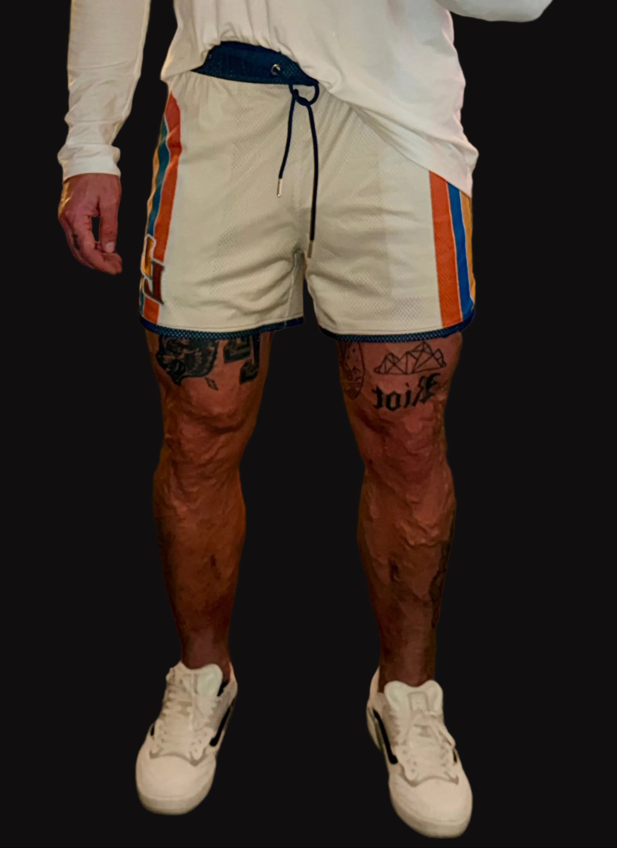 Retro Heat mesh gym shorts on model