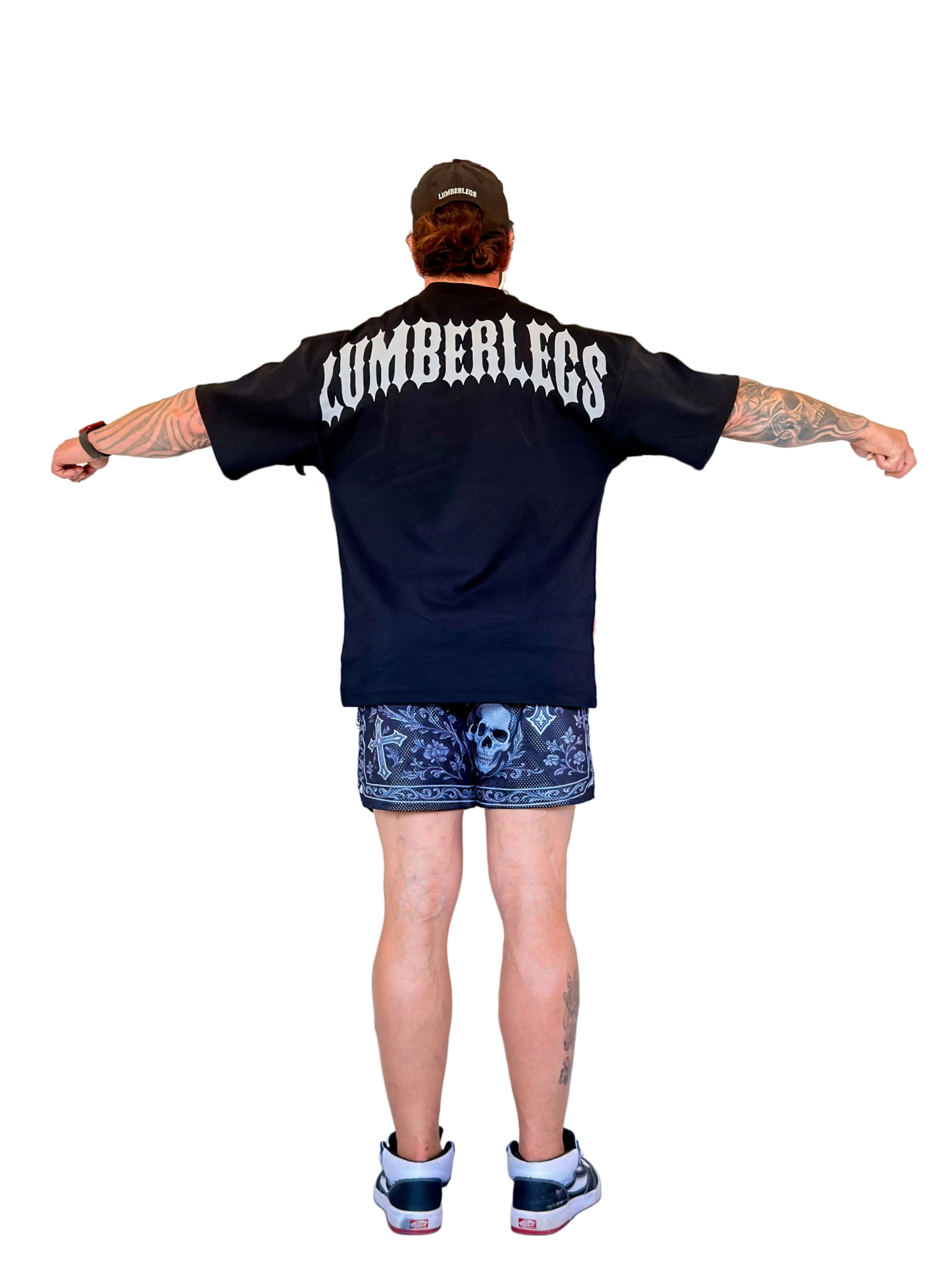 Model wearing oversized LumberLegs black gothic tee shirt