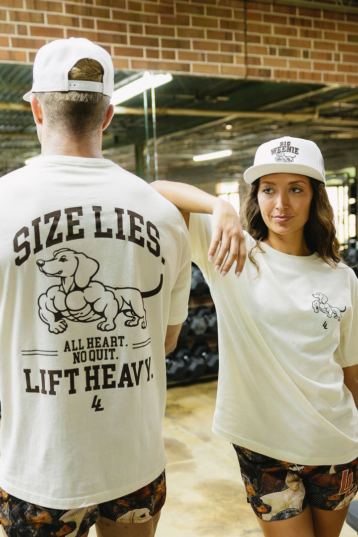 Translation missing: en.Male and female wearing dachshund shorts, hat, and shirt