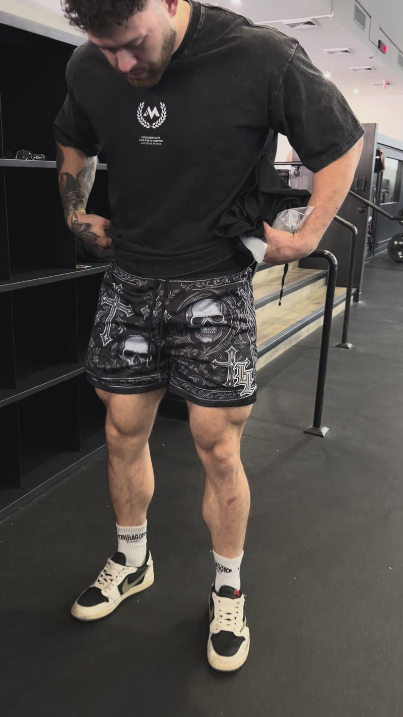 Man Wearing Grave Set Mesh Shorts