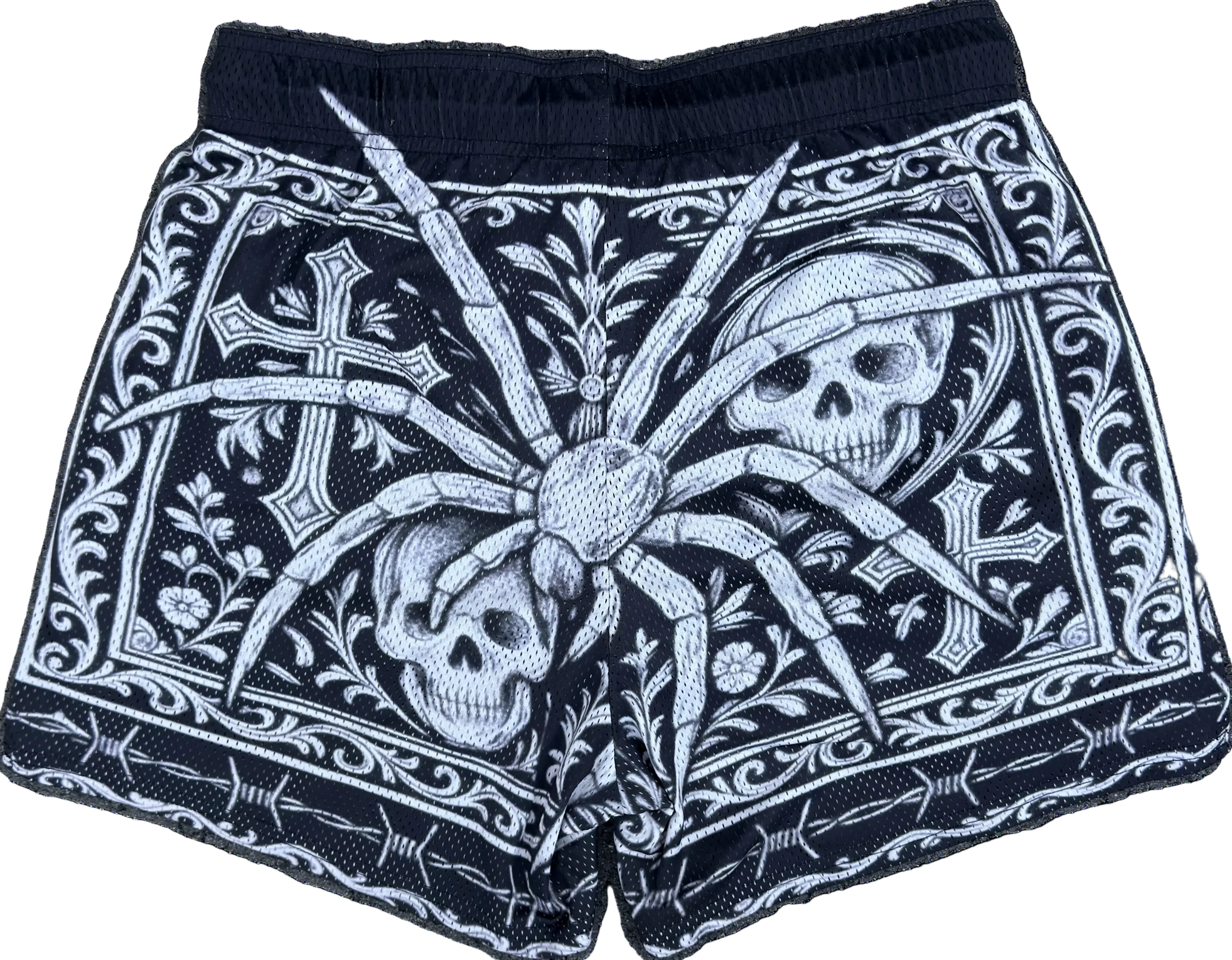 back view of gothic skull and spider mesh shorts